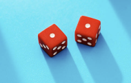 Two dice showing the number one